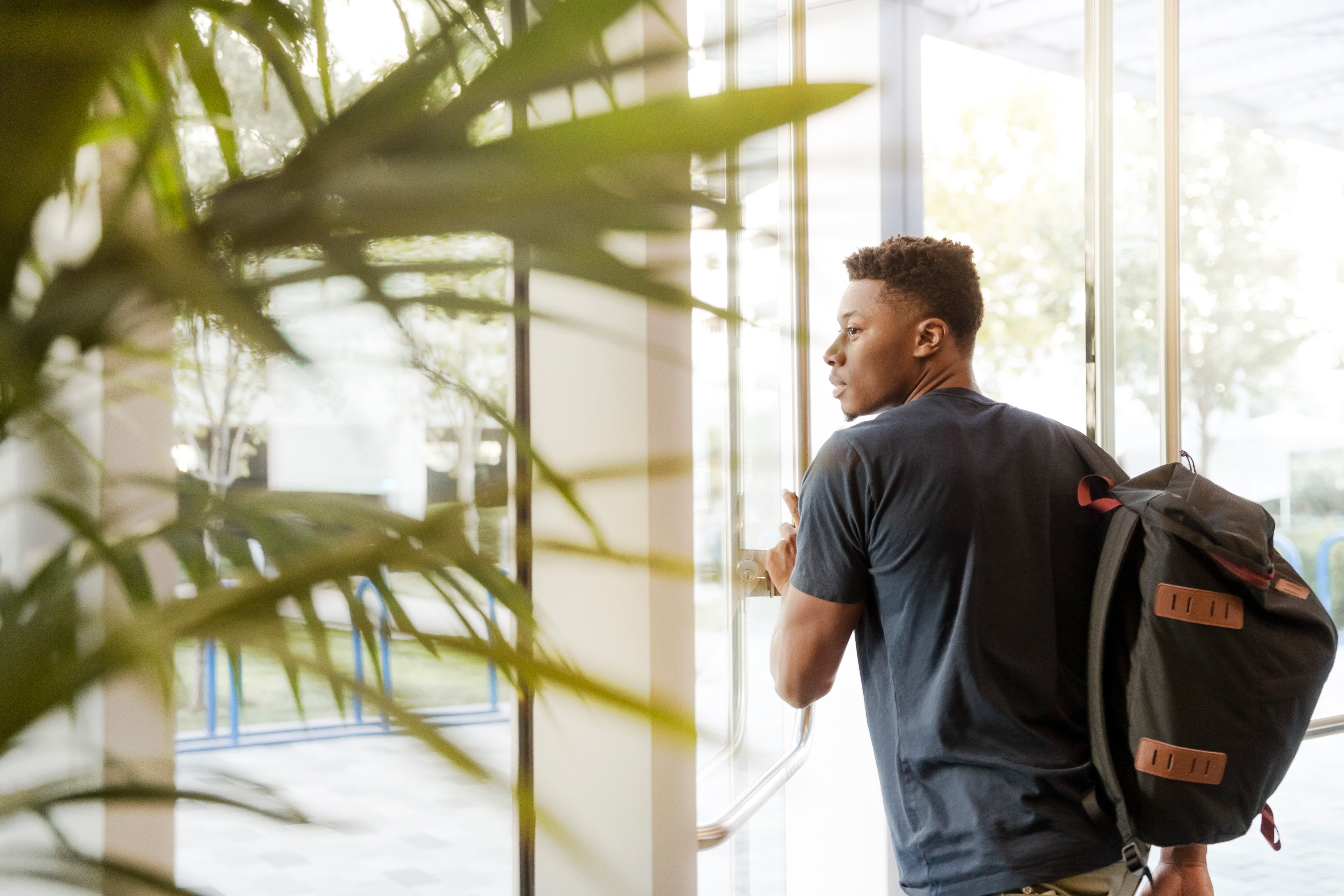 young man leaving work